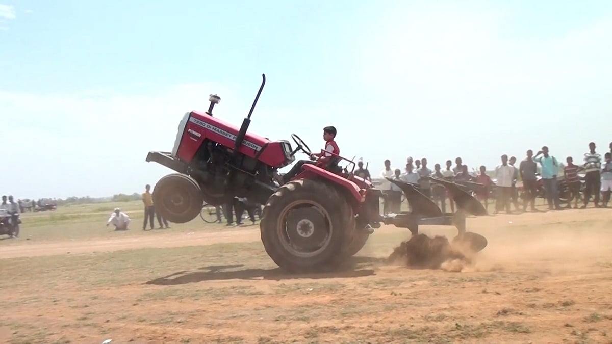Pintsized Boy Pops Wheelies While Driving a Tractor